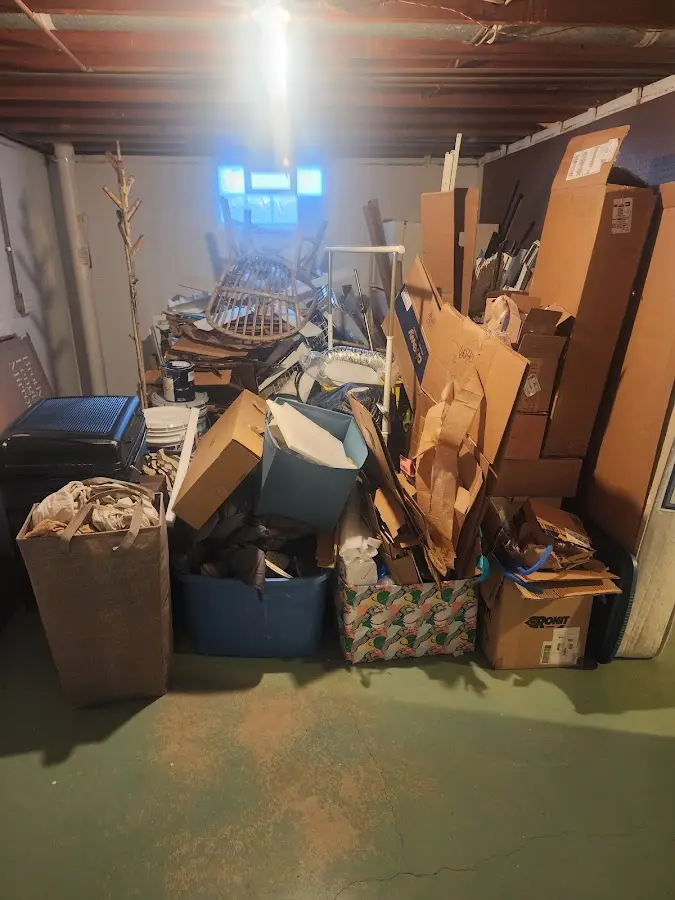 Roll-off dumpster container at job site for 15 Yard Dumpster Rental in Dubuque